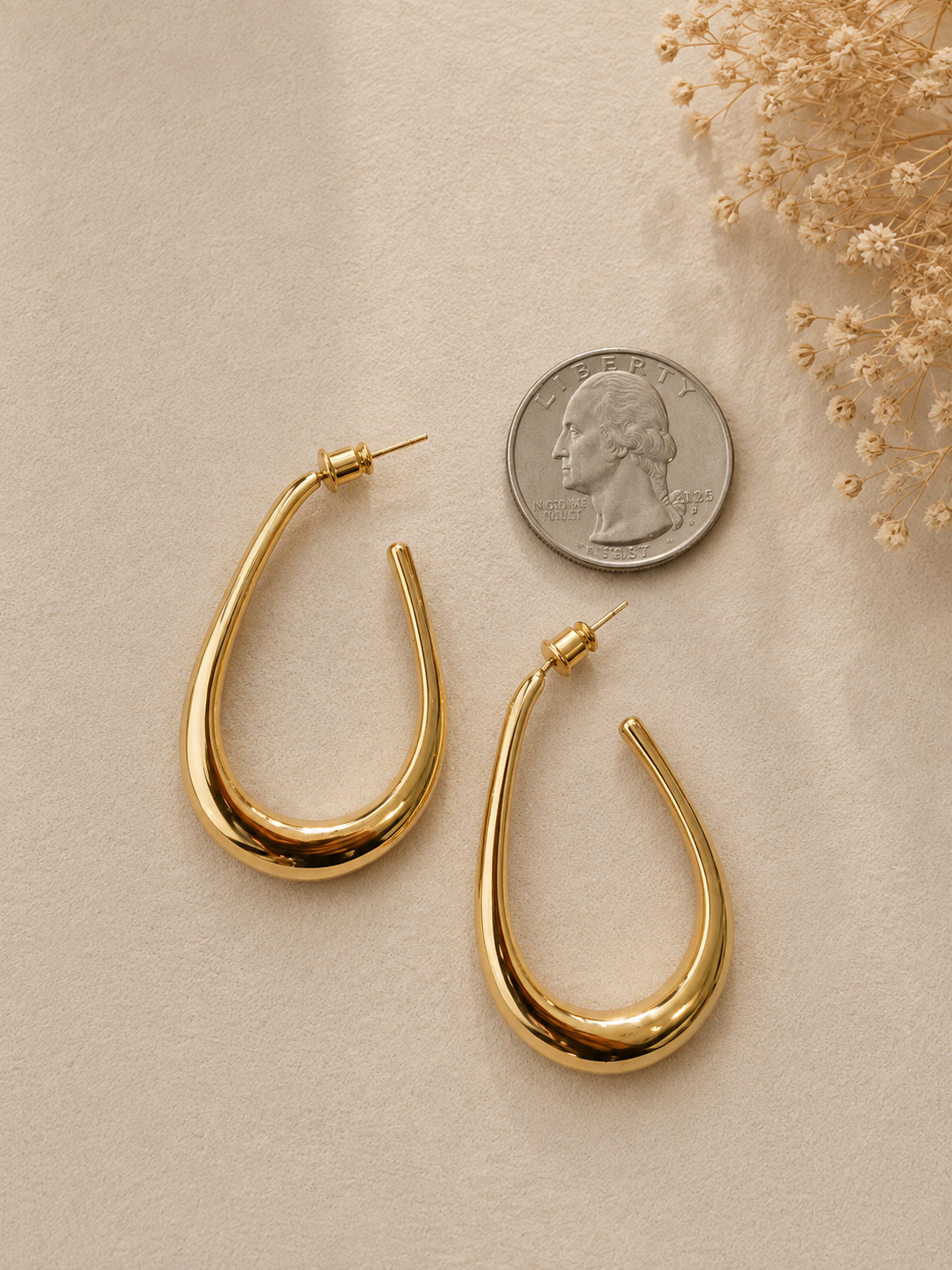 Golden Sculpted Teardrop Statement Hoops