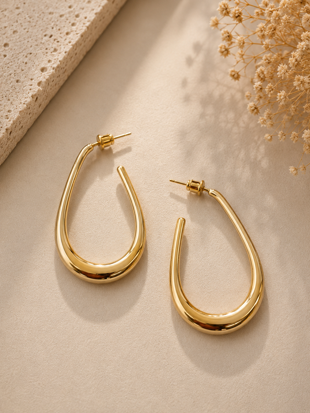 Golden Sculpted Teardrop Statement Hoops